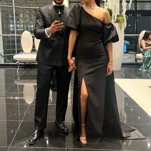 Likely Black One-Shoulder Gown